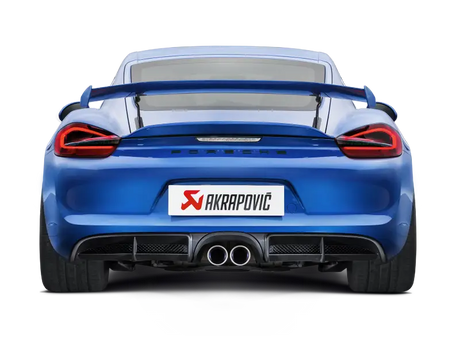 Blue sports car rear view featuring Akrapovic titanium exhaust on Porsche Boxster Spyder