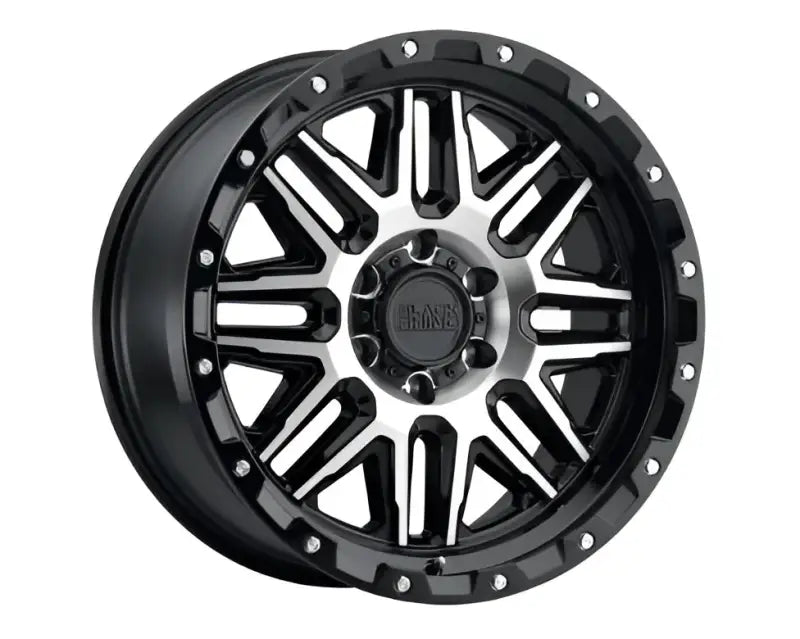 Black and white Alamo G-Black Machined off-road wheel with rugged design and matte finish