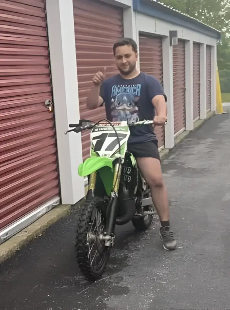 Green and black dirt bike.