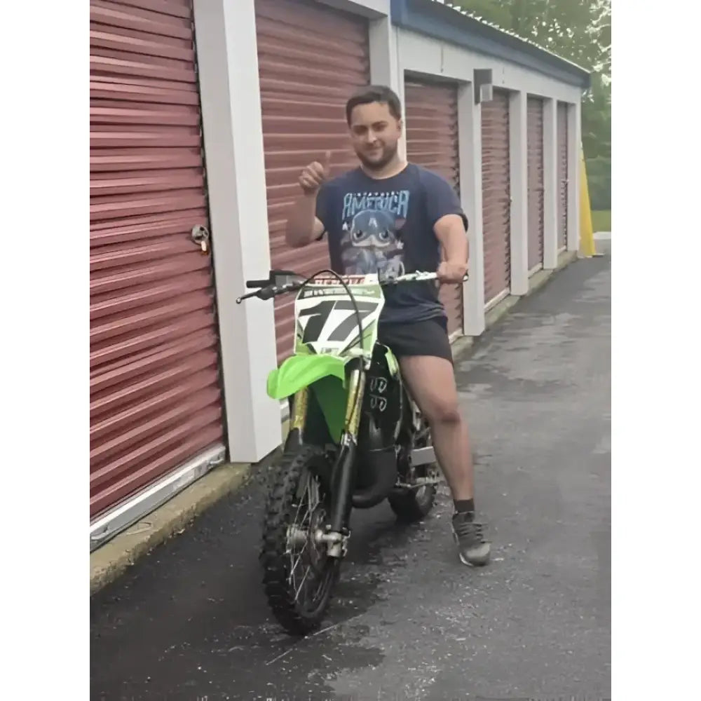 Green and black dirt bike.