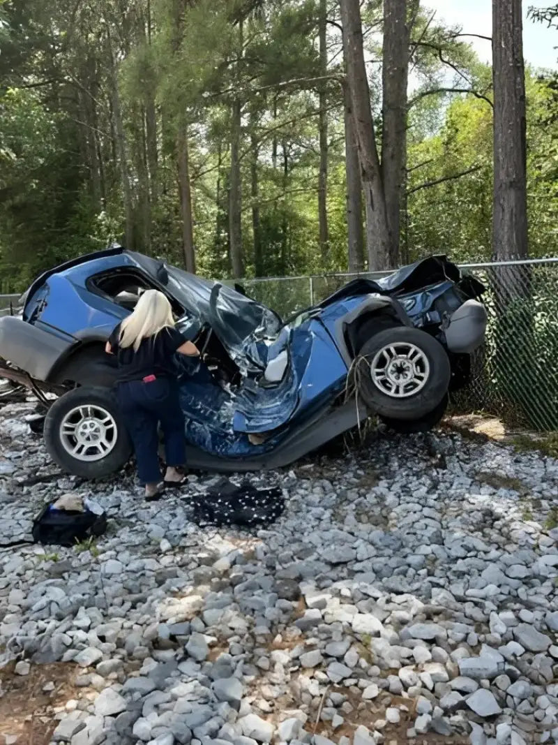 Damaged blue SUV with All Balls AB8-CA-8-339 extreme duty axle installed