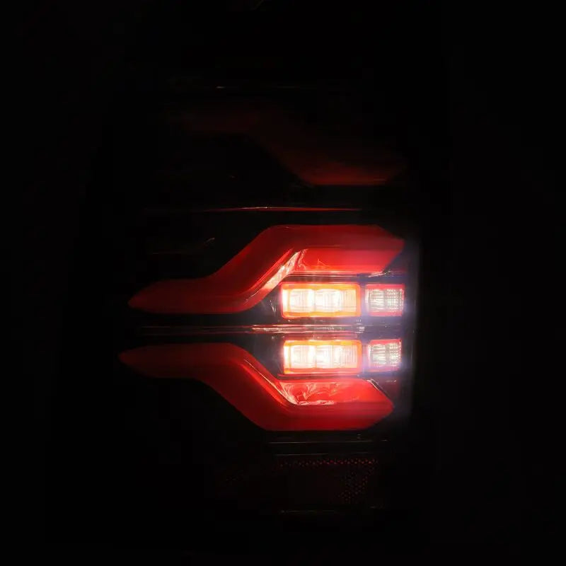 AlphaRex 680070 AlphaRex 05-15 Toyota Tacoma LUXX LED Taillights Blk/Red w/Activ Light/Seq Signal