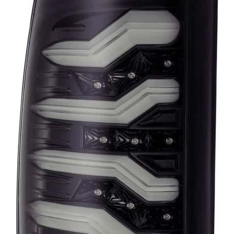 AlphaRex 09-18 Dodge Ram 1500 PRO-Series LED Tail Lights Jet Black close-up detail.