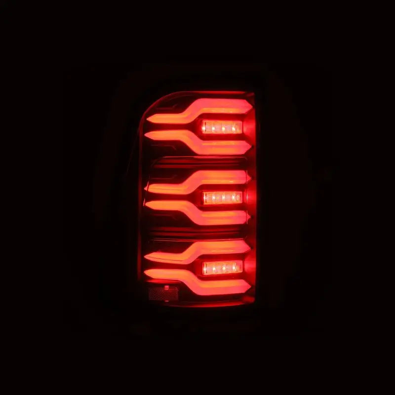 AlphaRex 19-21 Dodge Ram 1500 Luxx-Series LED Tail Lights Black w/Activ Light/Seq Signal - Truck & Automotive