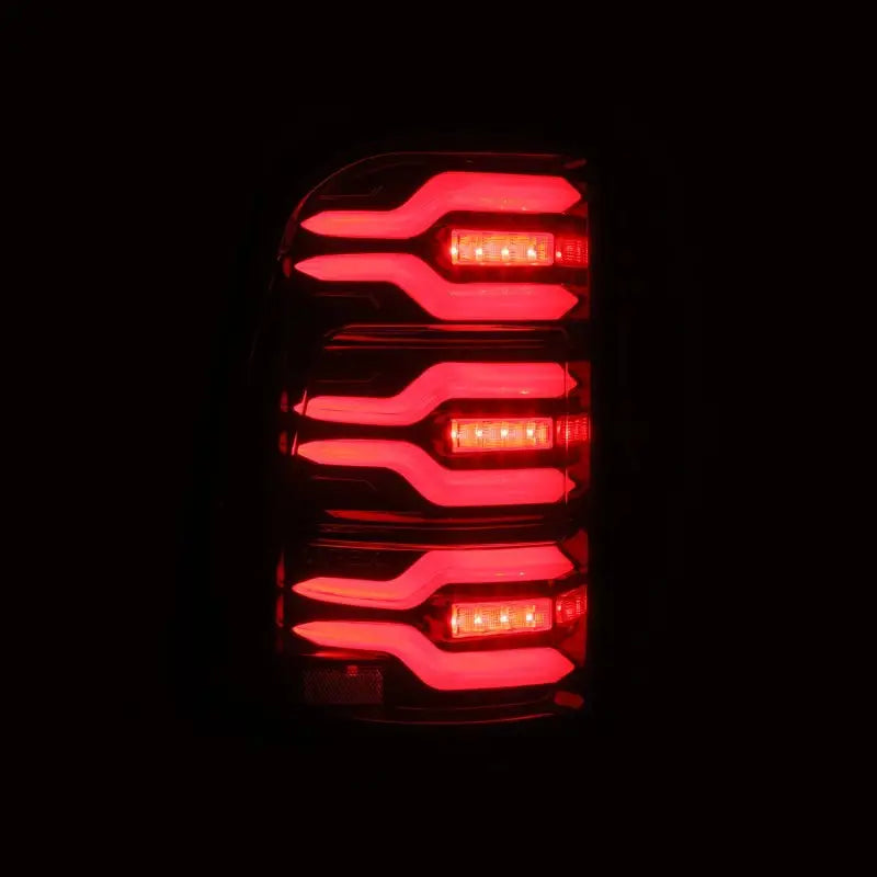 AlphaRex 19-21 Dodge Ram 1500 Luxx-Series LED Tail Lights Black/Red w/Activ Light/Seq Signal - Truck & Automotive