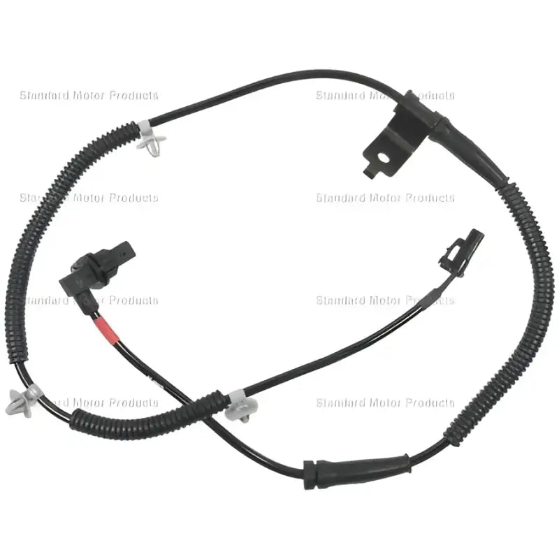 Black anti-lock brake sensor with mounting hardware.