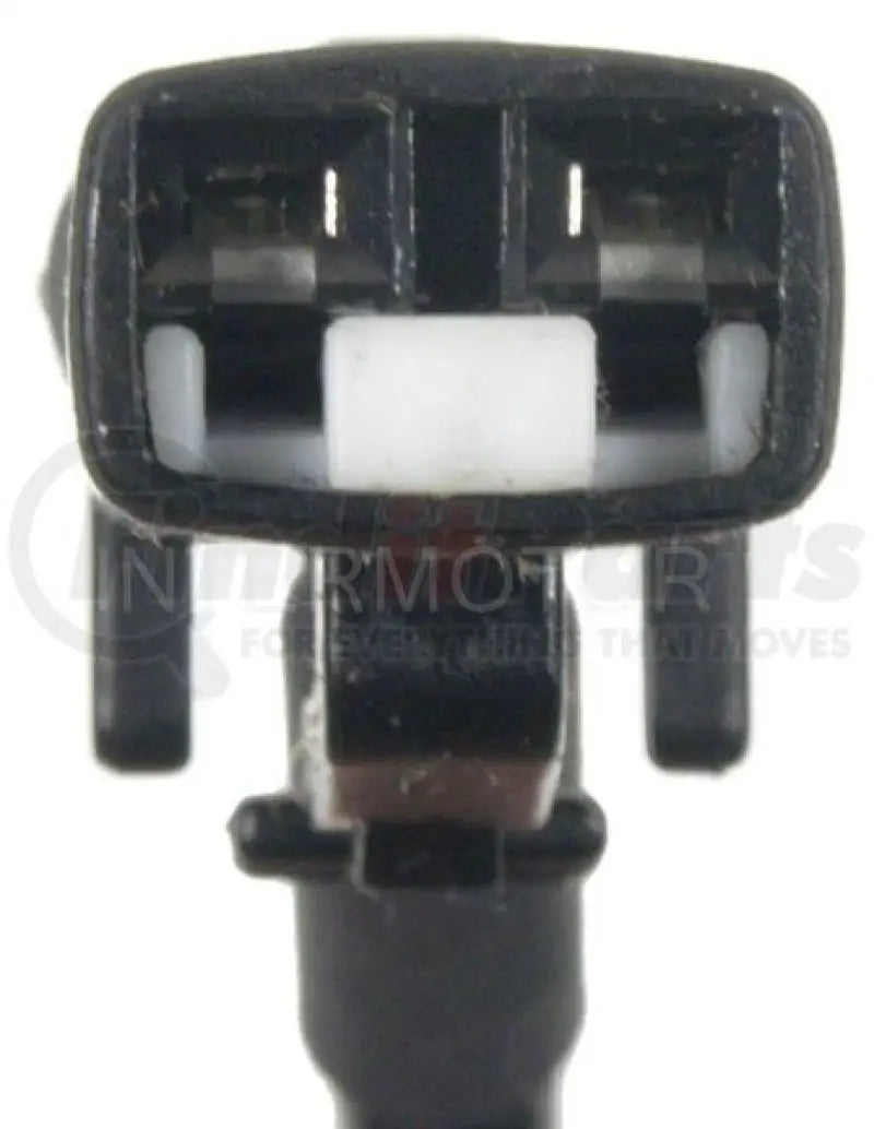Black electrical connector with white latch.