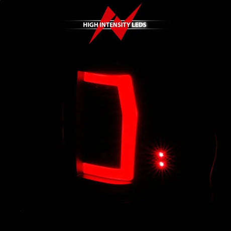 Illuminated red LED taillight assembly for Nissan Titan with black housing and smoke lens