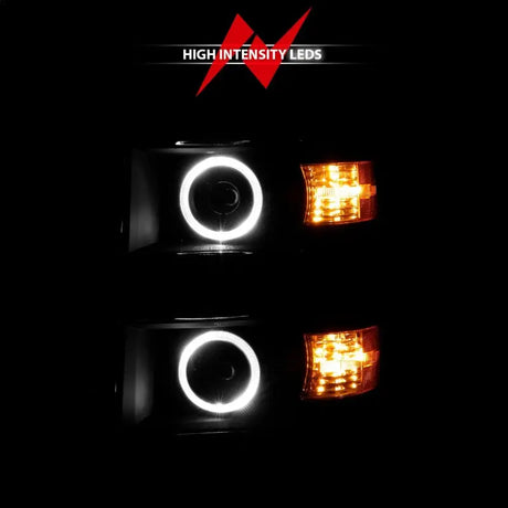 Chevrolet Silverado projector headlights with black housing, amber turn signals, and halo design