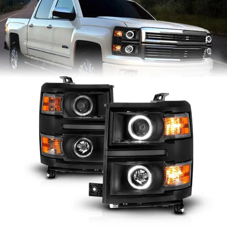 Chevrolet Silverado projector headlights with black housing and LED halos for a sleek look