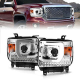 Chrome GMC Sierra plank style projector headlights with LED DRLs and amber turn signals