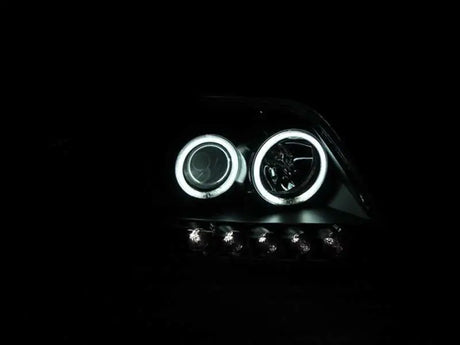 ANZO 1997-2003 Ford F-150 Projector Headlights w/ Halo Black (CCFL) 