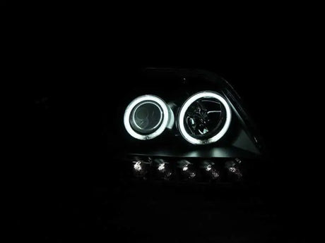 ANZO 1997-2003 Ford F-150 Projector Headlights w/ Halo Black (CCFL) 