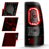 Black LED tail light assembly for Chevy Silverado with plank style smoke lens