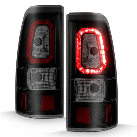 Pair of black LED taillights for Chevy Silverado 1999-2002 in plank style with smoke lens