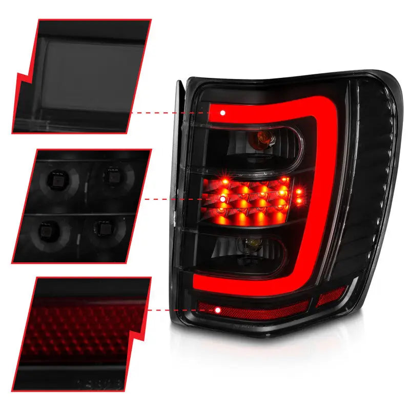 ANZO 1999-2004 Jeep Grand Cherokee LED Tail Lights w/ Light Bar Black Housing Smoke Lens - Truck & Automotive