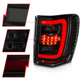 ANZO 1999-2004 Jeep Grand Cherokee LED Tail Lights w/ Light Bar Black Housing Smoke Lens - Truck & Automotive
