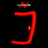 ANZO 1999-2004 Jeep Grand Cherokee LED Tail Lights w/ Light Bar Black Housing Smoke Lens - Truck & Automotive