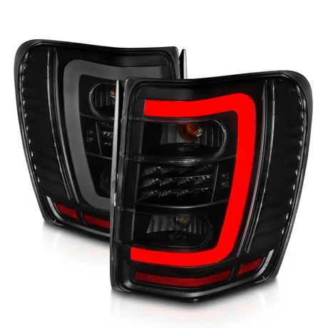 ANZO 1999-2004 Jeep Grand Cherokee LED Tail Lights w/ Light Bar Black Housing Smoke Lens - Truck & Automotive