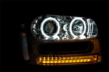 Chevrolet Trailblazer projector headlight set with white halo rings and amber LED signals