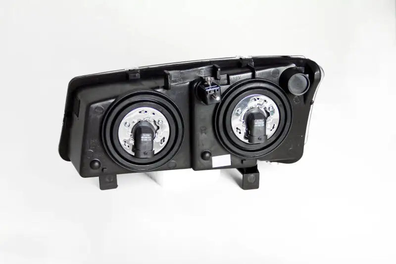 Rear view of Chevrolet Silverado crystal headlights black with two bulb sockets installed