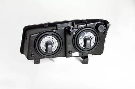Rear view of black chevrolet silverado crystal headlights with two bulb sockets