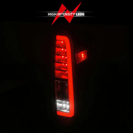 Illuminated Nissan Frontier LED taillights with black housing and clear lens