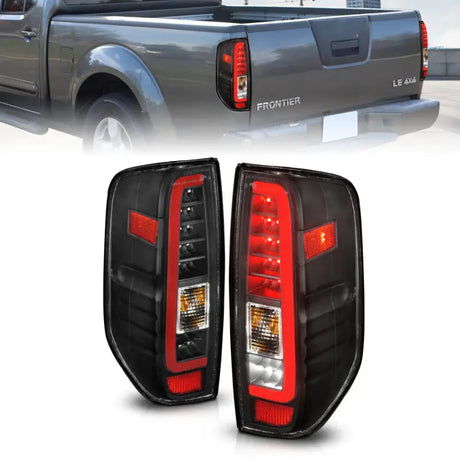 Black aftermarket LED taillights for Nissan Frontier with clear lens and black housing
