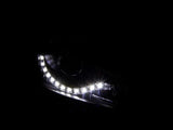 Illuminated Audi A3 projector headlights with LED style daytime running lights
