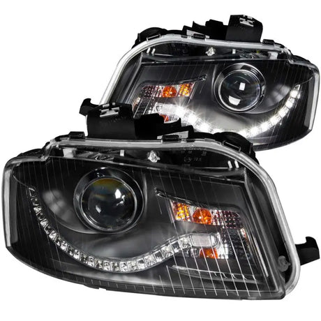 Black aftermarket projector headlights for Audi A3 with LED style daytime running lights