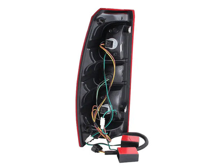 Rear view of ANZO Chevrolet Avalanche LED taillights with exposed wiring and bulbs in red clear style