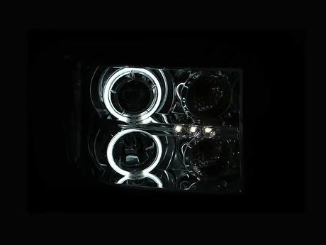 GMC Sierra projector headlights with halo chrome rings and LED accents for style