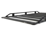 Black metal roof rack on ARB Base Rack Guard Rail Suits 1770020 for tough outdoor use