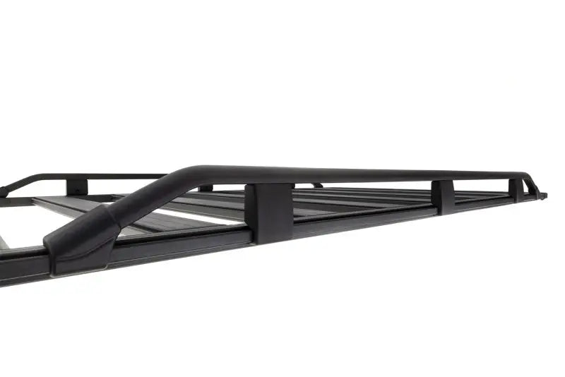 Black metal roof rack on ARB Base Rack Guard Rail Suits 1770020 for added protection