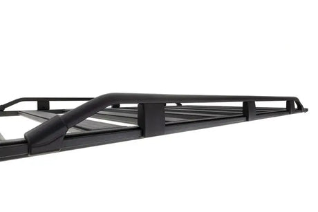 Black metal roof rack on ARB Base Rack Guard Rail Suits 1770020 for added protection