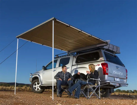 Silver Isuzu 4x4 pickup with arb canvas awn canada spec and fire retardant features