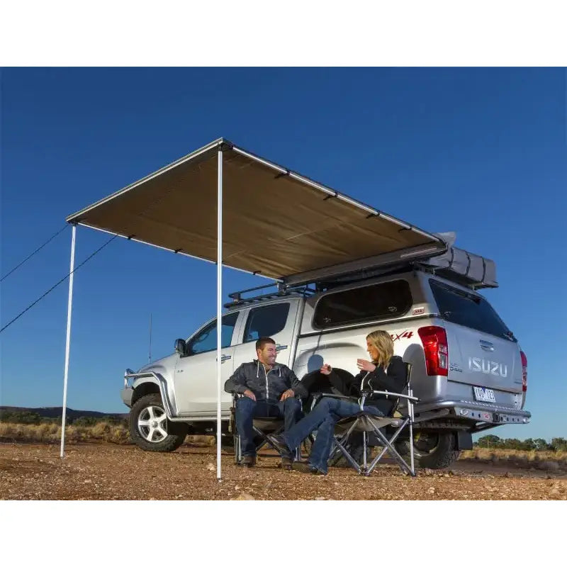 Silver Isuzu 4x4 pickup with arb canvas awn canada spec and fire retardant features