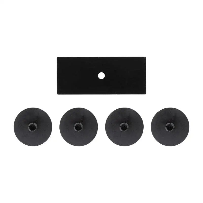 Black rectangular plate with four round discs for ARB Extra Leaf Spacer Kit
