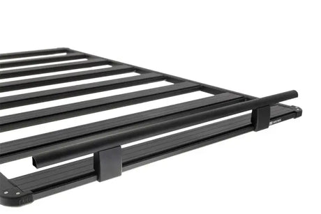 Black metal roof rack with ARB Guard Rail for added vehicle protection