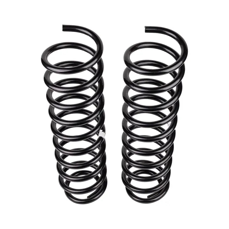 Two black OME coil springs for Jeep Jk front suspension upgrade