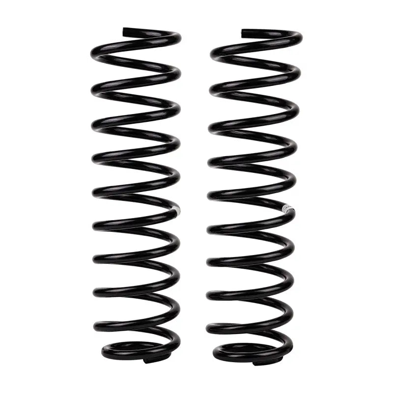 Two black OME coil springs for Jeep JK front heavy-duty coil spring upgrade