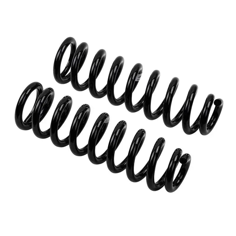 Black coil springs from ARB / OME Coil Spring Front LC 200 Series for ride quality