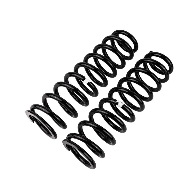 Two black OME coil springs for ARB / OME Coil Spring Front LC 70Ser vehicle