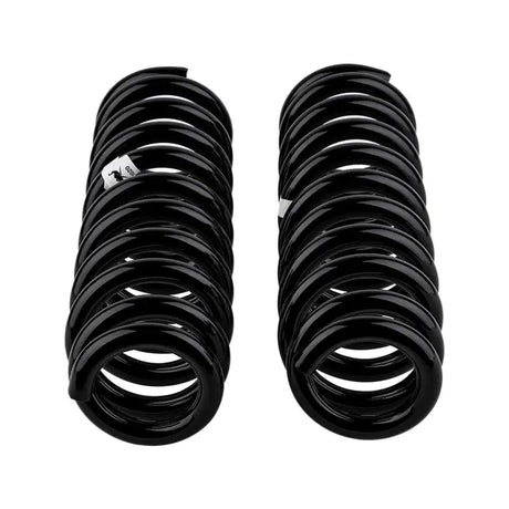 Two black coil springs for ARB / OME Coil Spring Front Prado To 2003 vehicle upgrade