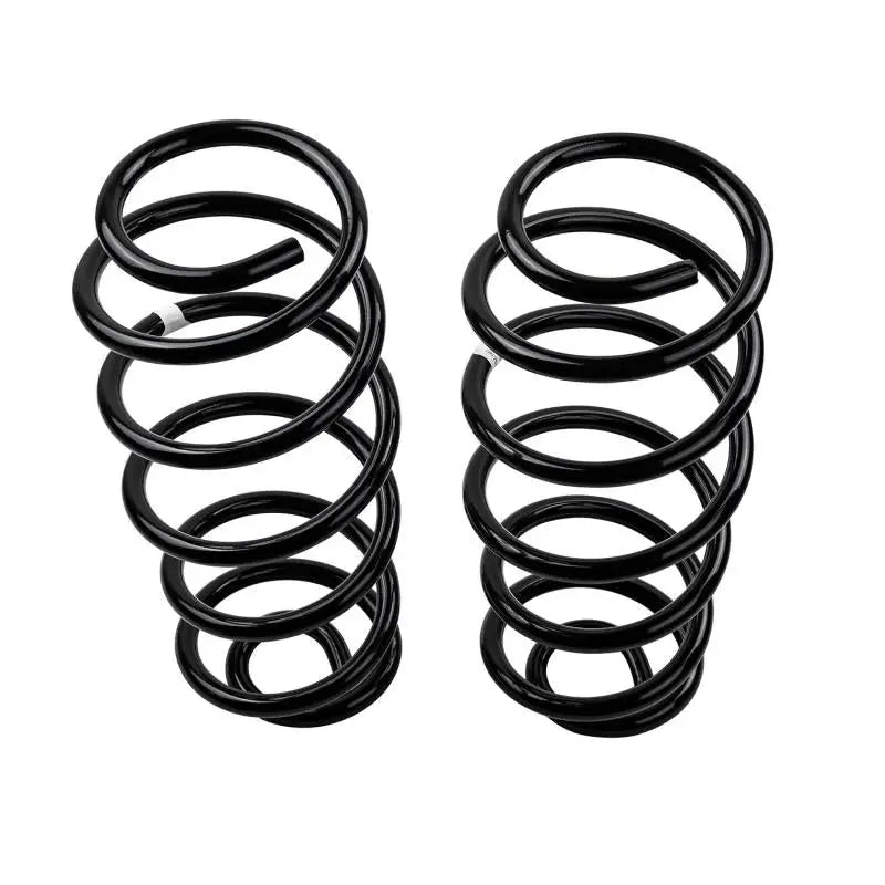 Pair of black OME coil springs for rear Jeep JK, perfect for lift and off-road use