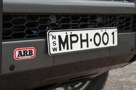 Vehicle’s license plate with ARB Summit Combar ARB Fog for Disco 4 upgrade