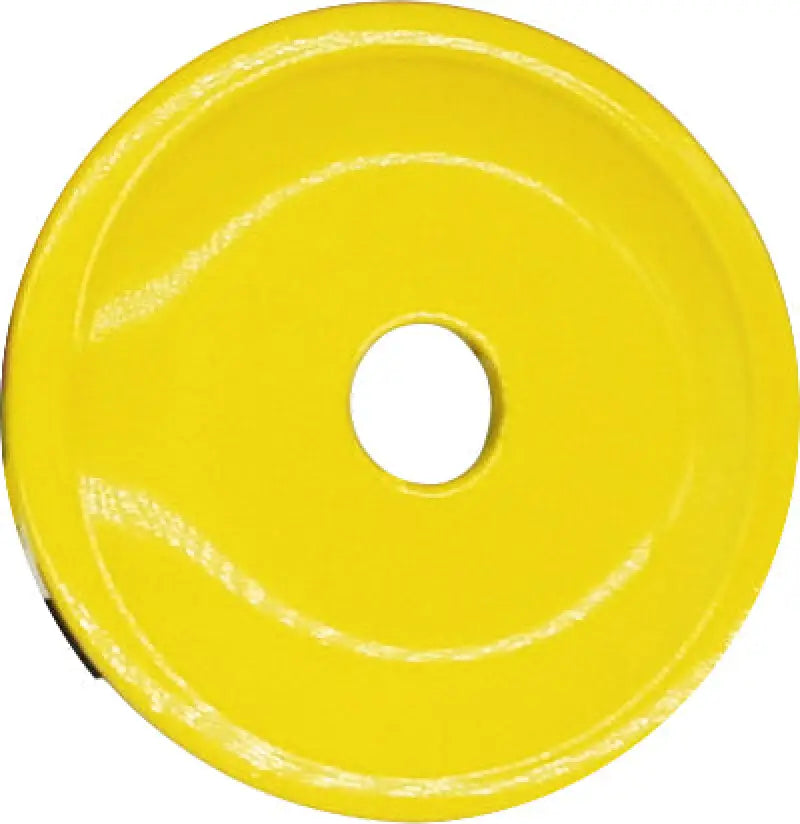 Yellow round grand digger support plate with central hole for heavy equipment building