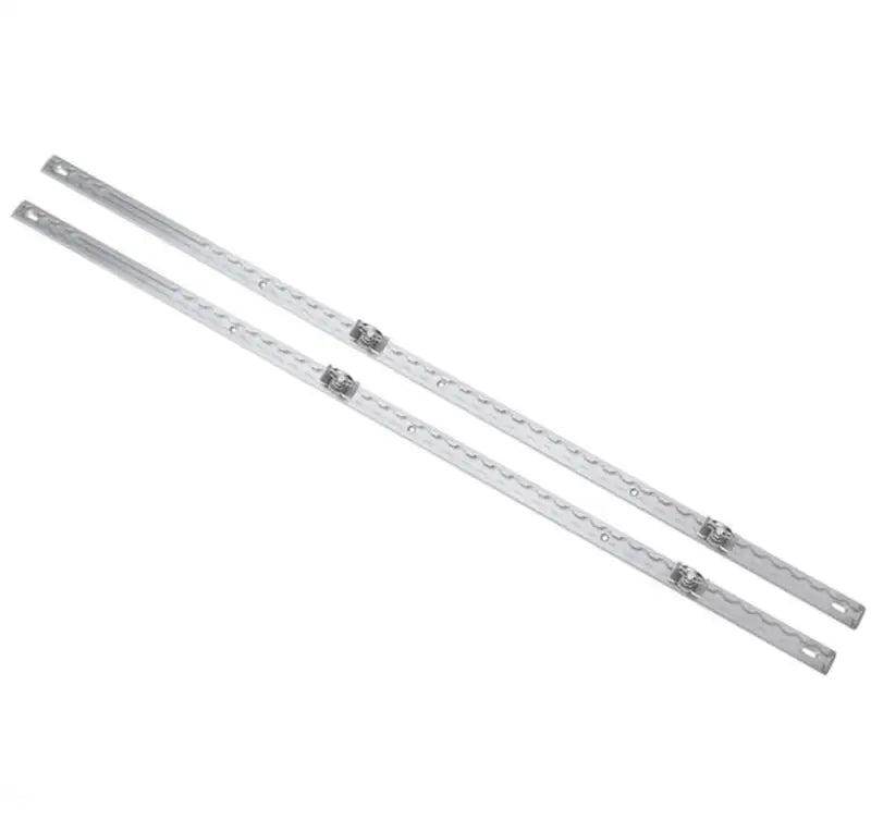 Two long silver LED light strips for Decked Midsize Core Trax cargo management