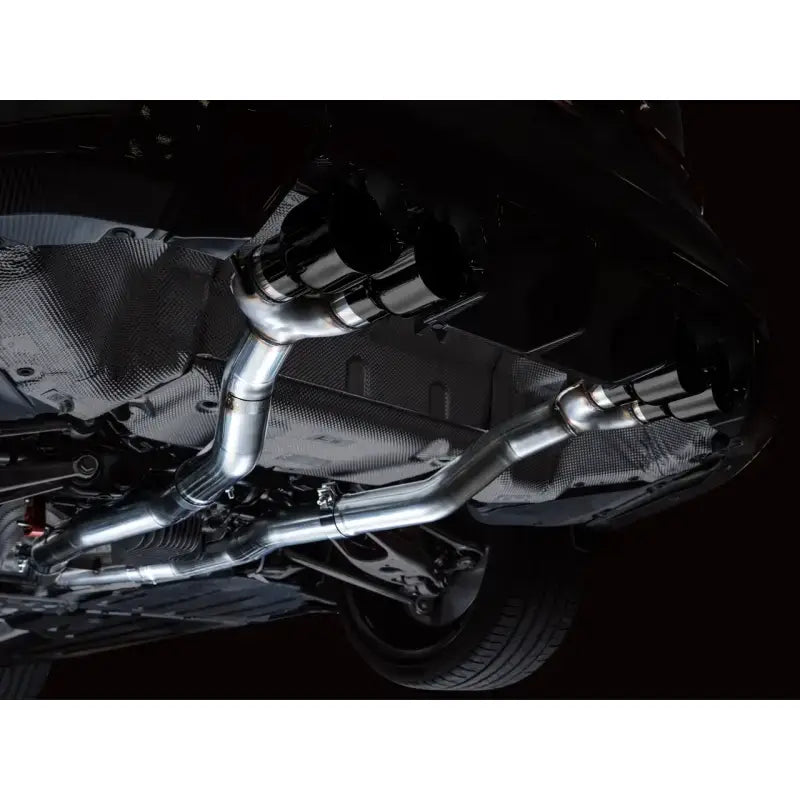 AWE Track Edition Catback Exhaust with Diamond Black Tips for BMW G8X M3/M4 installed on vehicle.
