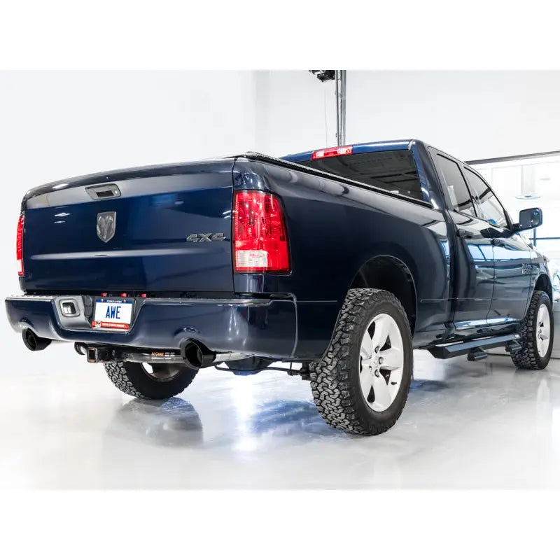 AWE Tuning 3015-33004 AWE Tuning 09-18 RAM 1500 5.7L (w/Cutouts) 0FG Dual Rear Exit Cat-Back Exhaust - Diamond Black Tips